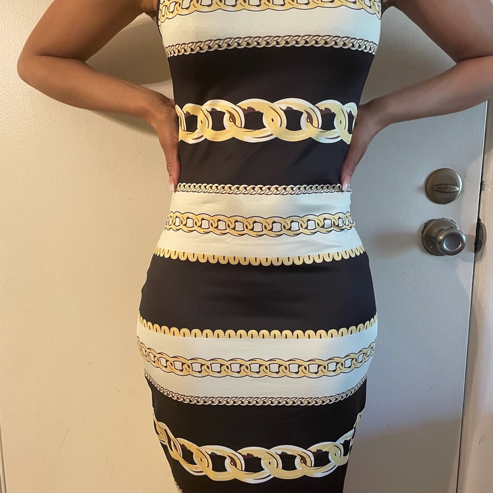Beige white and black body fit dress